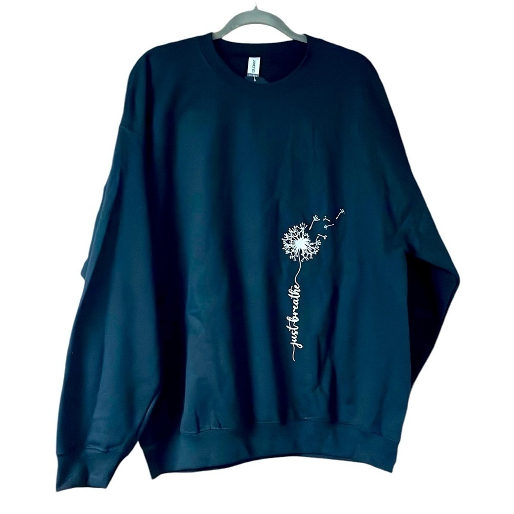 size XL black sweatshirt with graphic design